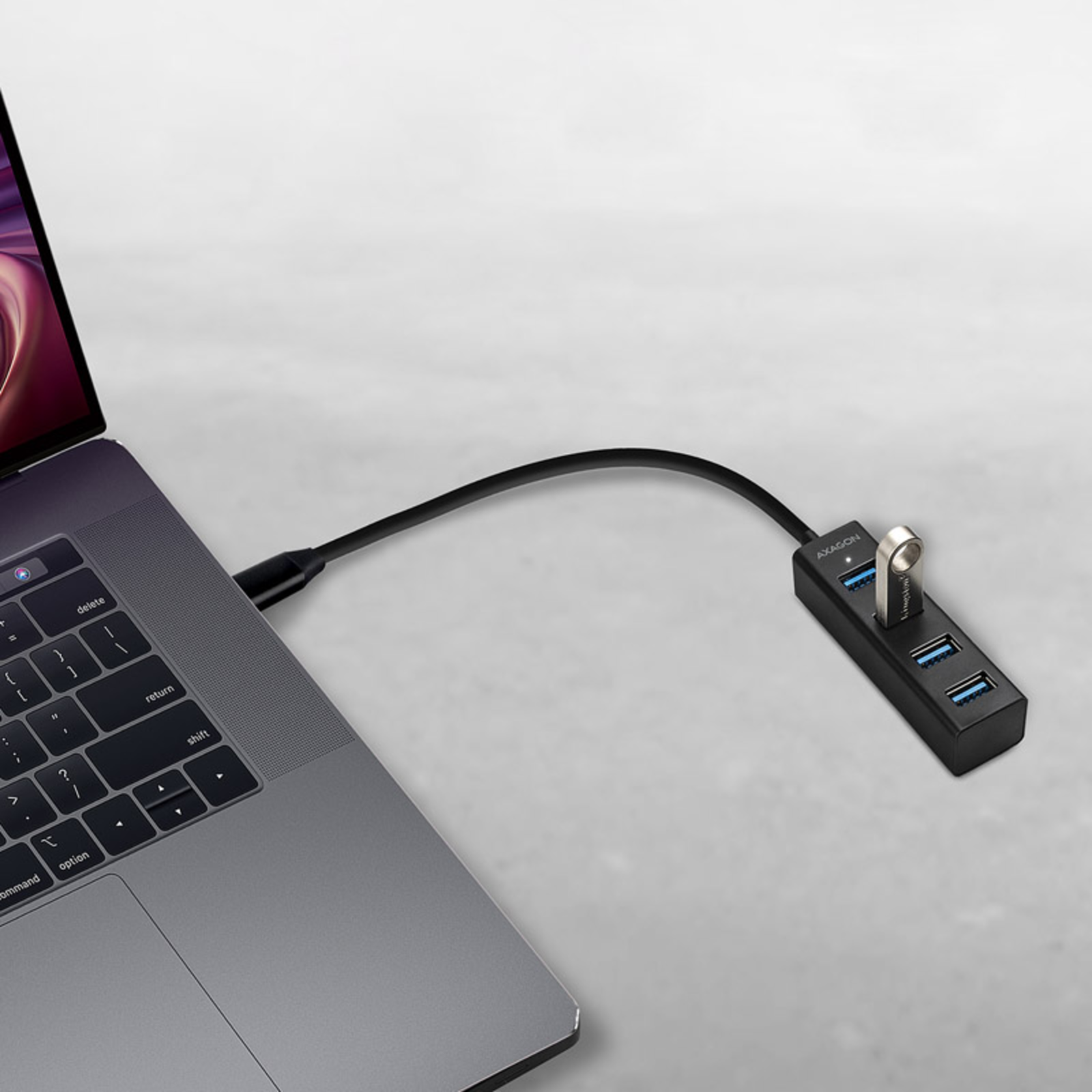 Axagon HUE-M1C Superspeed USB-C Mini Hub 4x USB 3.0 20cm Black
